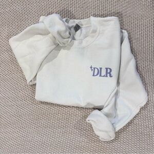 Adorable DLR Sweatshirt with Walt quote on back perfect for Disney Parks